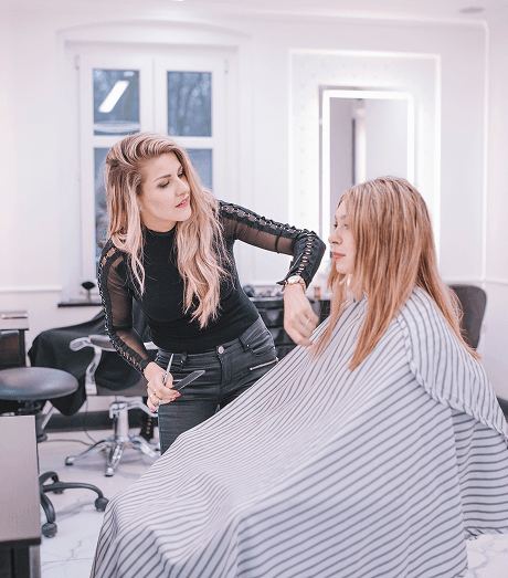 woman-taking-care-girl-salon 1
